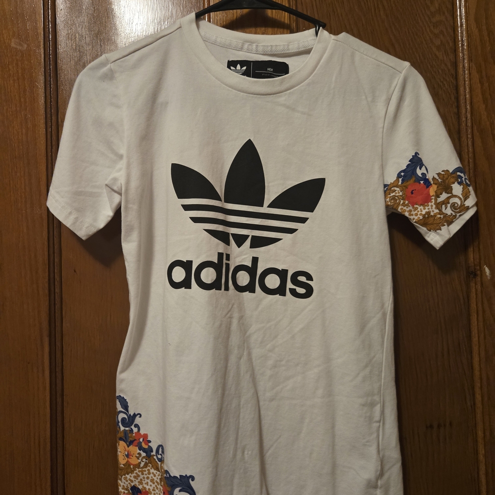 Adidas White Tee with Black Logo and Floral Accents